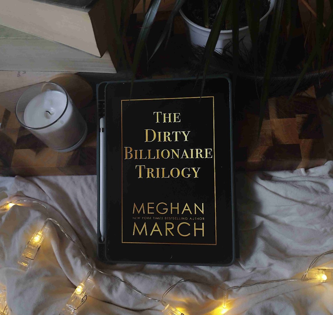 [  3,5/5 ⭐ ] |In Ordnung|

🟨  INHALT 

New York Times best-selling author Meghan March brings you the complete Dirty Billionaire Trilogy under one cover! Have you been missing obsessive and possessive billionaires? Find out why over a million readers love Creighton Karas! He answers to no one and is denied nothing. He leads his company like a marauder, rampaging through financial markets and scores of women worldwide until the unthinkable sets in... boredom. At least, until he meets a southern spitfire who disappears after an explosive one-night stand. He will stop at nothing to find her, and when he does, he plans on making her the next Mrs. Creighton Karas. Rising country star Holly Wix isn’t ready for Creighton Karas, but he’ll take her on the ride of a lifetime to find their happily ever after.