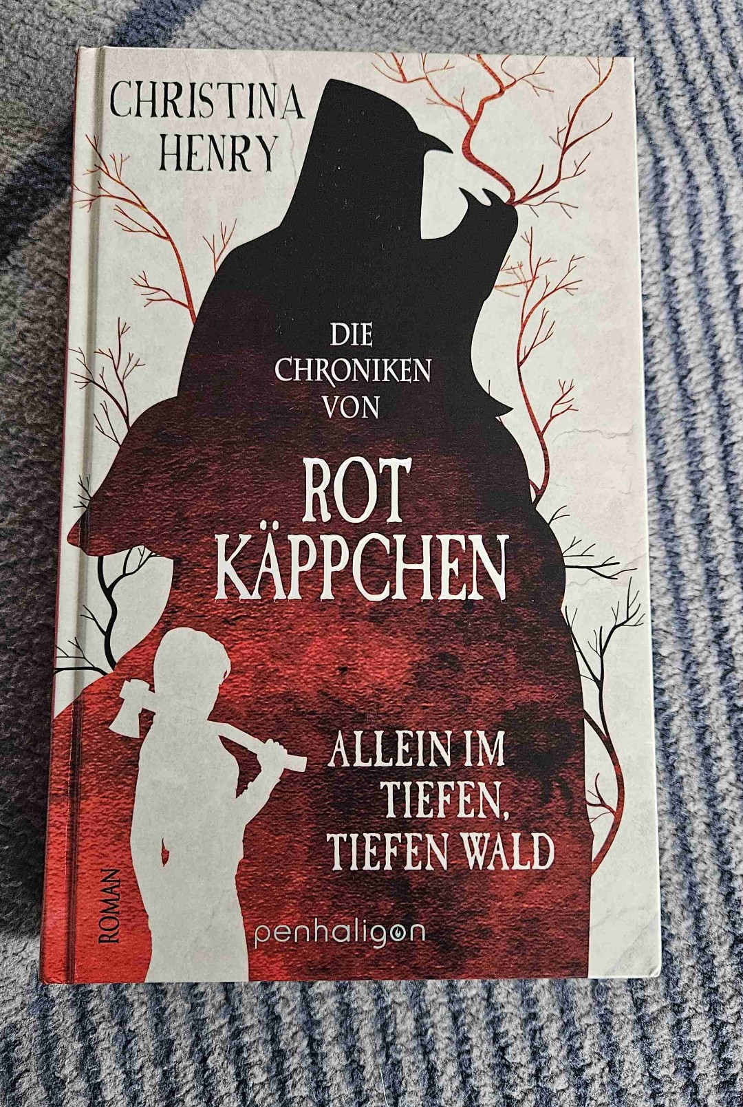 This book is about Red, who has some terrifying encounters on the way to her grandmother's house. A crisis triggered by a cough leads to Red having to fight for her survival, literally. There are many dangers on her way through the forest. 
