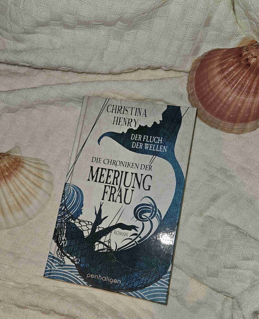 In "The Mermaid" by Christina Henry, Amina, a mermaid, ventures onto land, seeking a new life away from the ocean's depths. Drawn into a mysterious circus filled with fantastical beings, she encounters love, danger, and the harsh realities of human existence. This dark reimagining of a classic tale explores themes of identity and sacrifice, as Amina must decide where she truly belongs. A hauntingly beautiful story that captures the essence of both fantasy and reality.