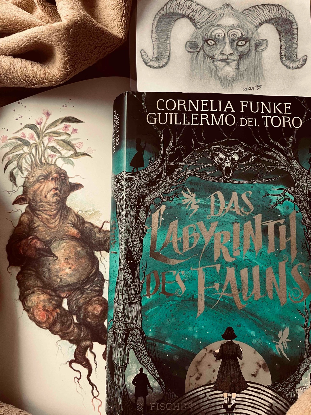 >Das ist eine magische Wurzel!<, schluchzte Ofelia. >Der Faun hat sie mir gegeben.<