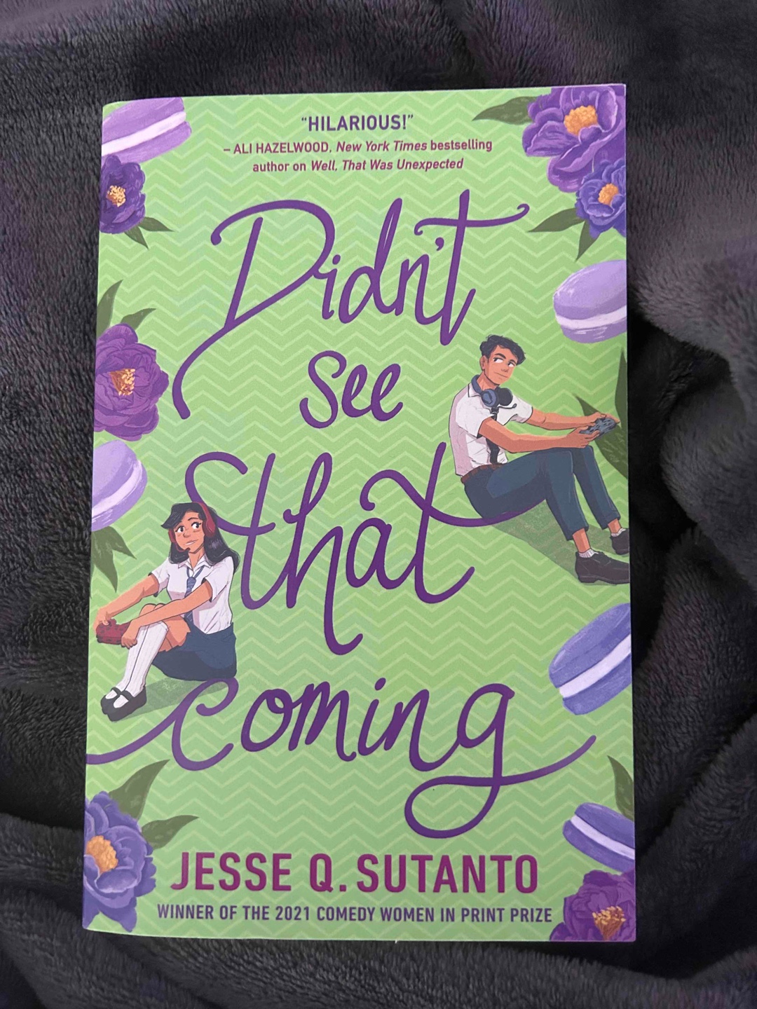 This book follows 16-year-old Kiki, a gamer girl who is starting at a new school. But when Kiki finds out her online bestie also goes there, she worries she's in trouble. Because Kiki has been playing as a guy online, and she thinks she might like Sourdawg.